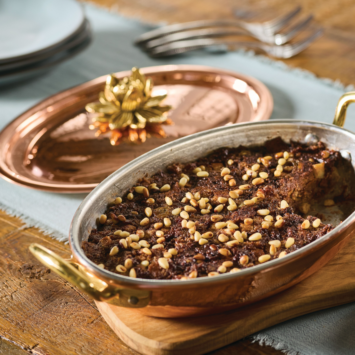 Italian cake prepared and served in the Ruffoni Historia Lotus 10" Covered Oval Gratin