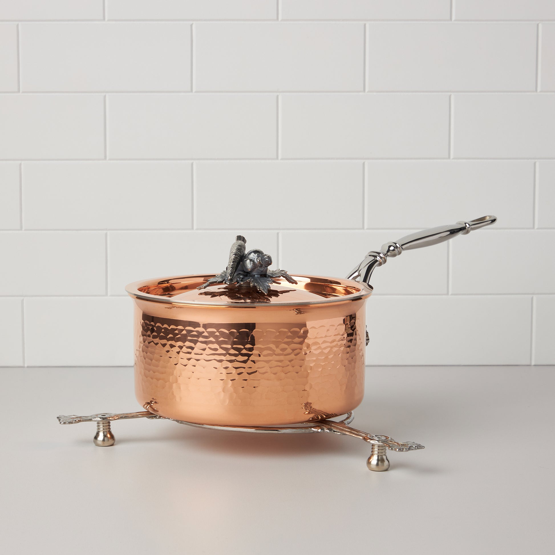 Ruffoni stainless steel trivet photographed with Ruffoni Opus Cupra copper Saucepan