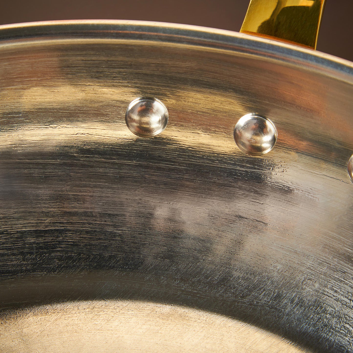 High purity, durable tin lining applied by hand over fire meets solid hammered copper in the 10" Open Skillet from Ruffoni Historia collection