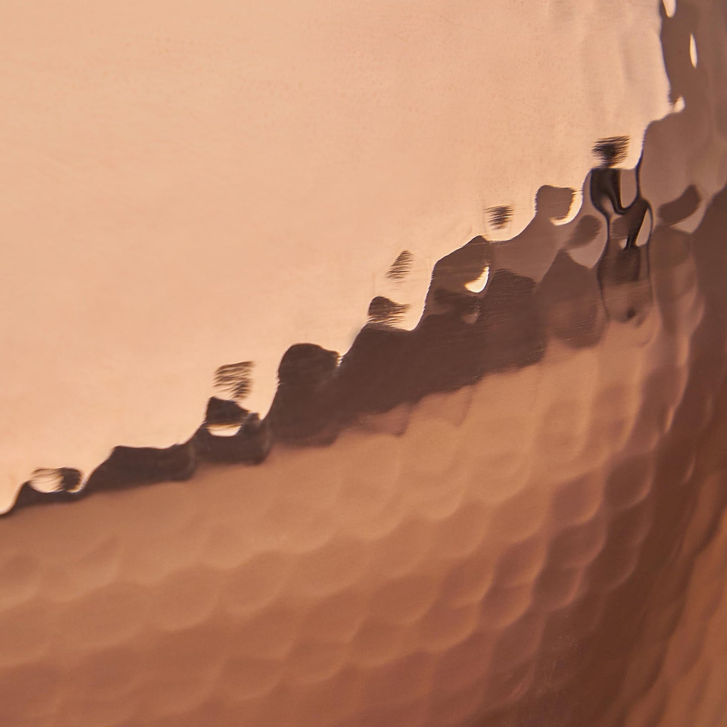 Signature hammering finish on copper 11" Open Skillet from Ruffoni Historia, applied to ensure increased strength and lasting beauty