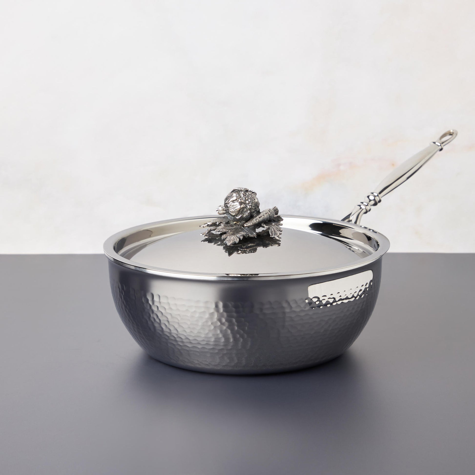 Opus Prima hammered clad stainless steel chef pan with decorated silver-plated lid knob finial from Ruffoni