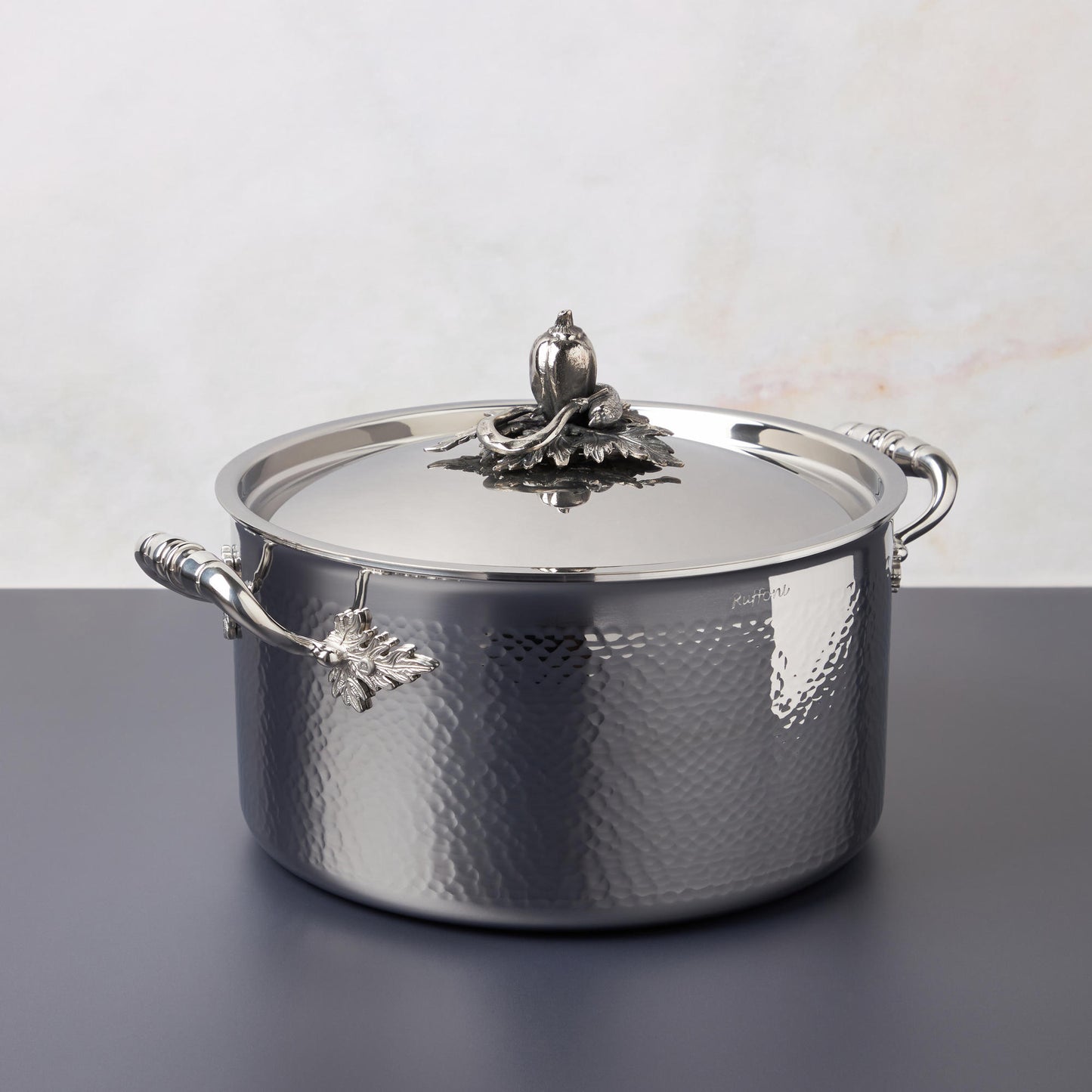 Opus Prima hammered-clad stainless steel stockpot with decorated silver-plated lid knob finial from Ruffoni