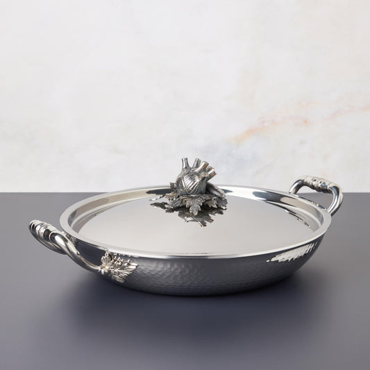 Opus Prima hammered clad stainless steel gratin also known as serving fryng pan with decorated silver-plated lid knob finial from Ruffoni