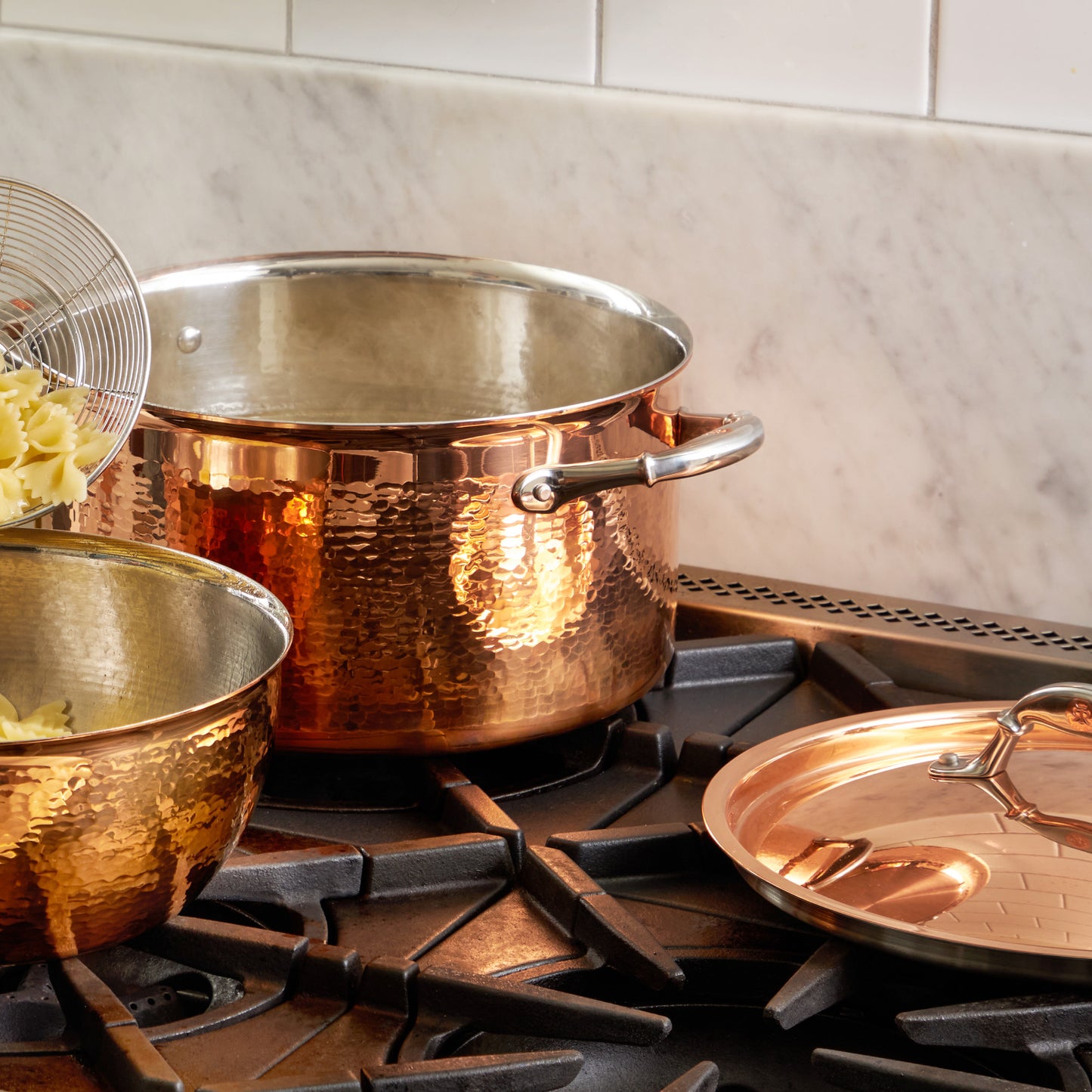 Stockpot with lid in hammered copper with stainless steel lining from Ruffoni