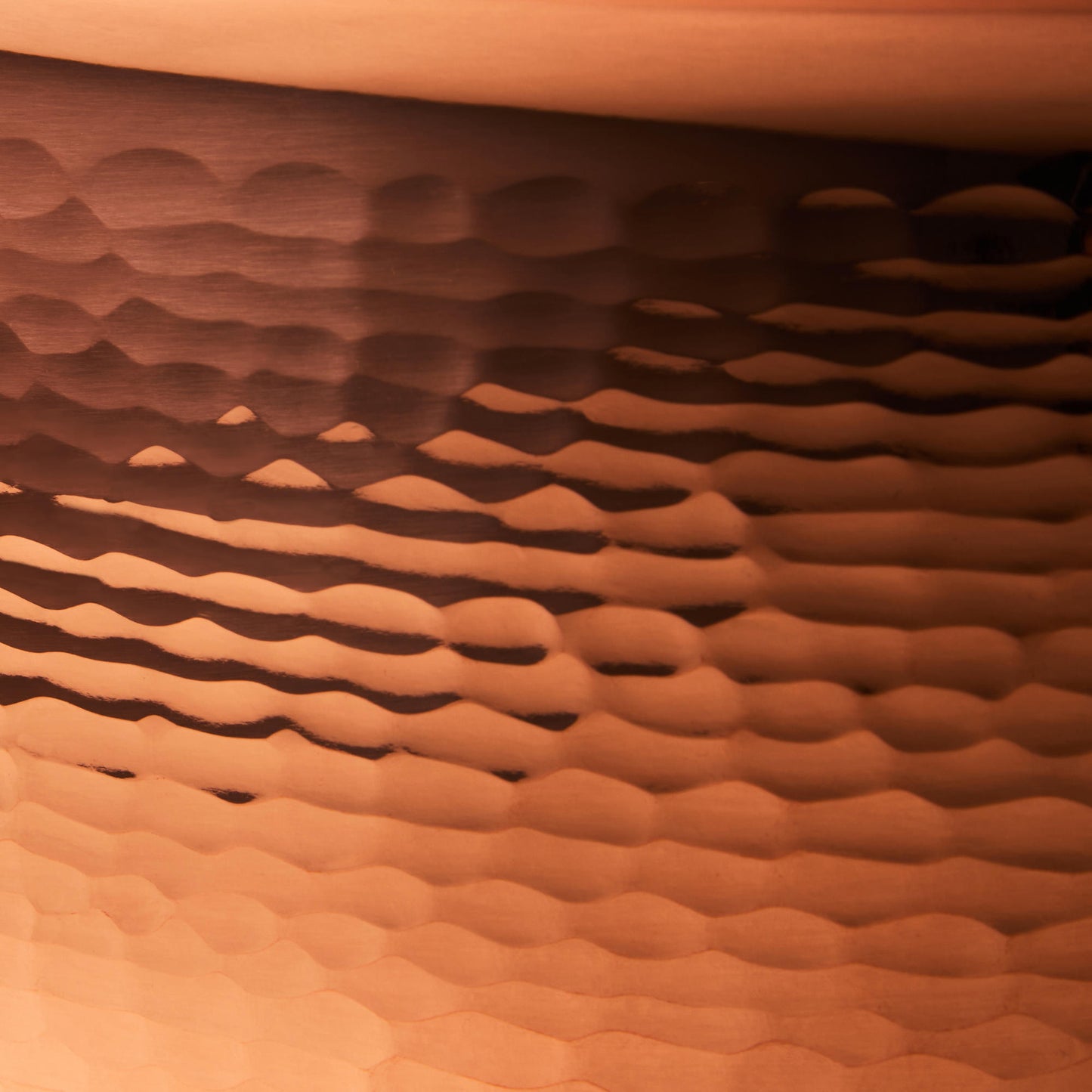 Hammering increases strength and beauty of copper clad with stainless steel soup pot from Ruffoni