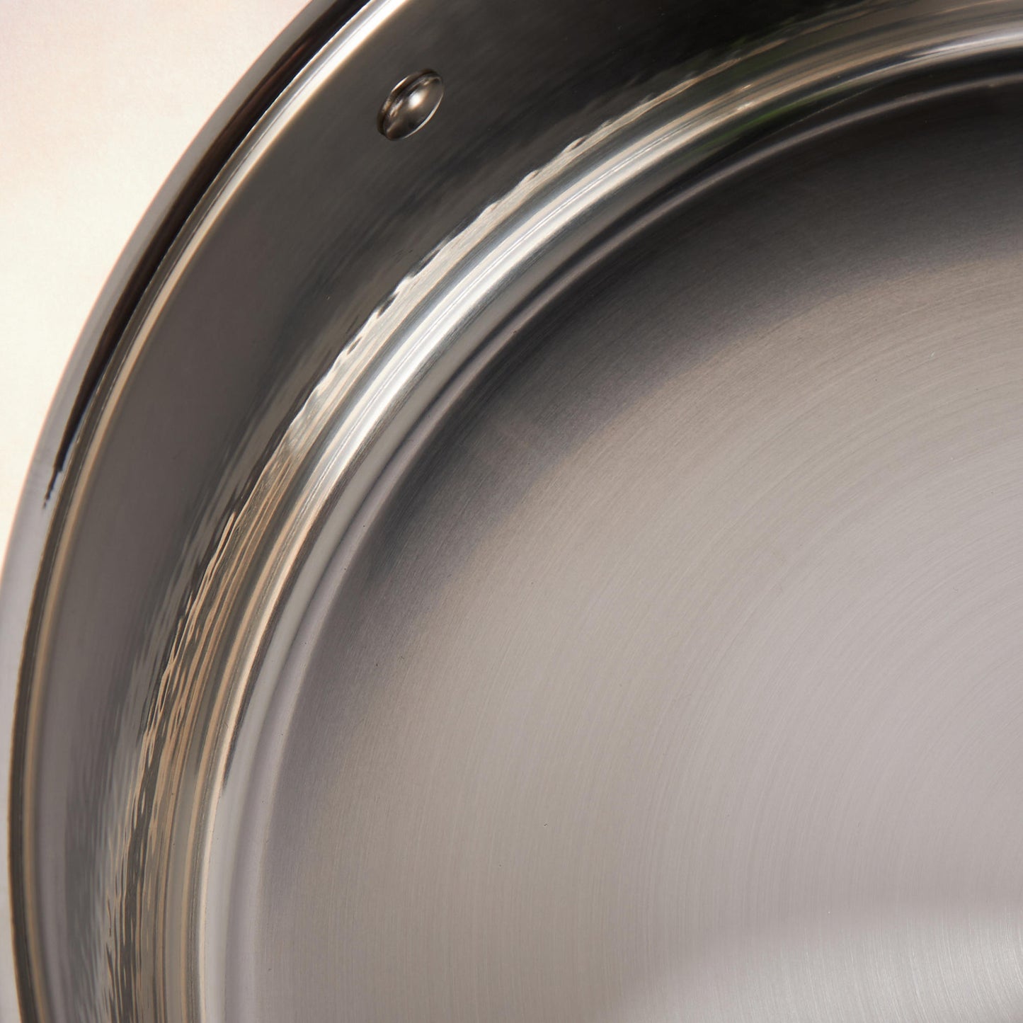 Sunray polished and hammered stainless steel lining in saucepan from Ruffoni