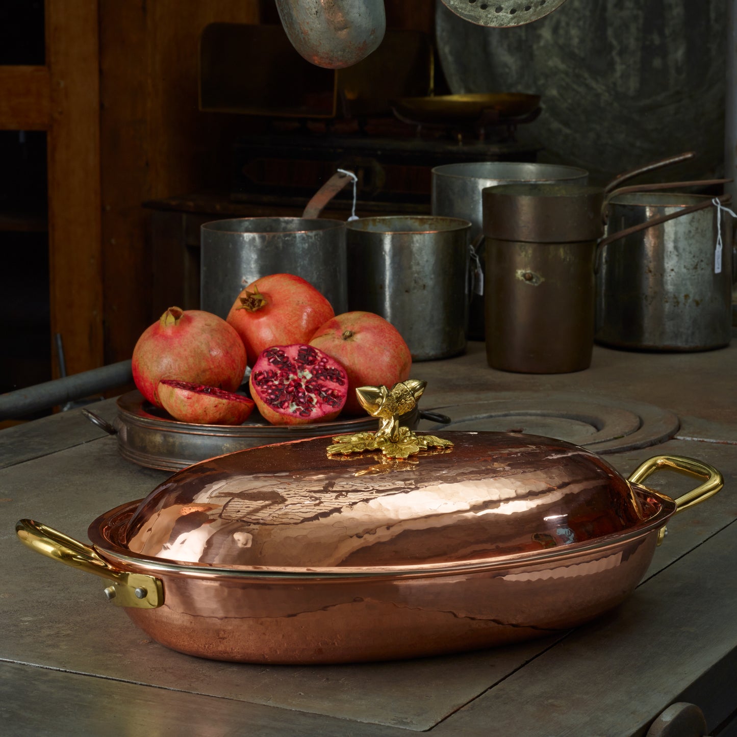 Hammered copper 4.5 Oval Low Braiser lined with high purity tin applied by hand over fire and bronze handles, from Ruffoni Historia collection