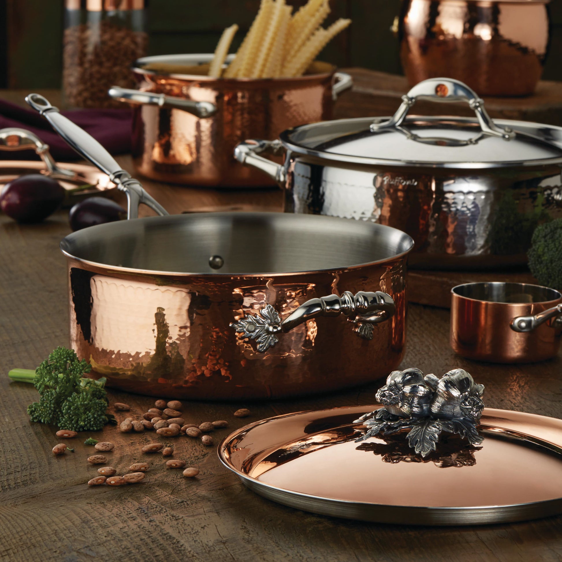 Opus Cupra hammered copper with stainless steel lining and decorated silver-plated lid knob finial from Ruffoni