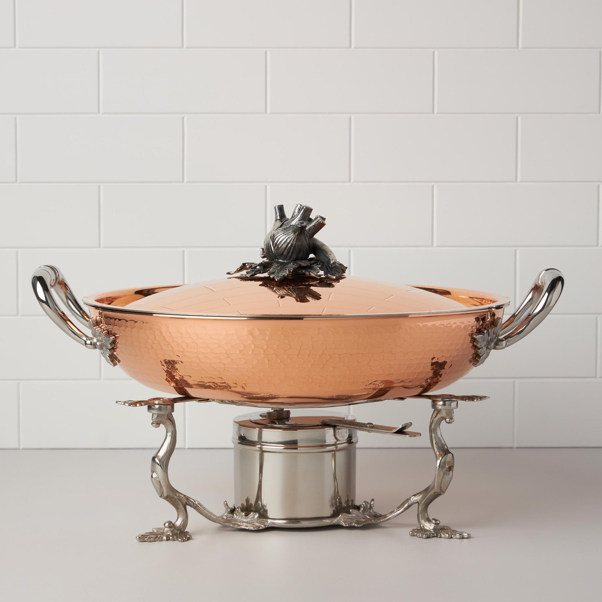 Ruffoni stainless steel warming stand for gel and candle photographed with a matching Opus Cupra serving frying pan