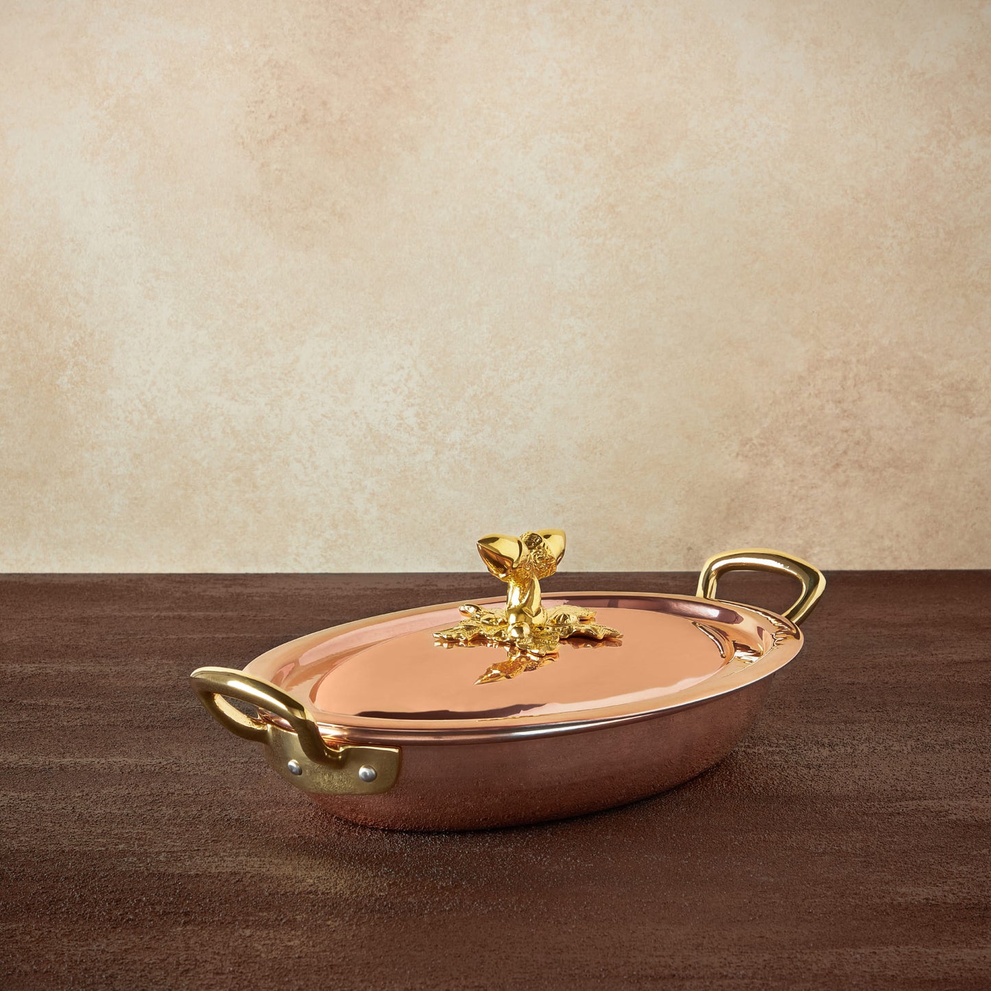 Hammered copper 11" Covered Oval Gratin lined with high purity tin applied by hand over fire and bronze handles, from Ruffoni Historia collection