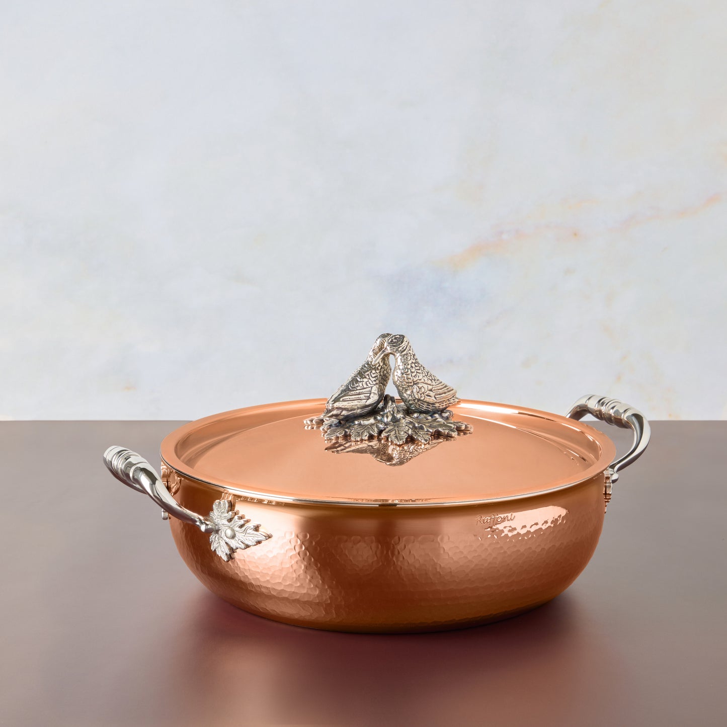 Opus Cupra hammered copper with stainless steel lining and decorated silver-plated lid knob finial from Ruffoni