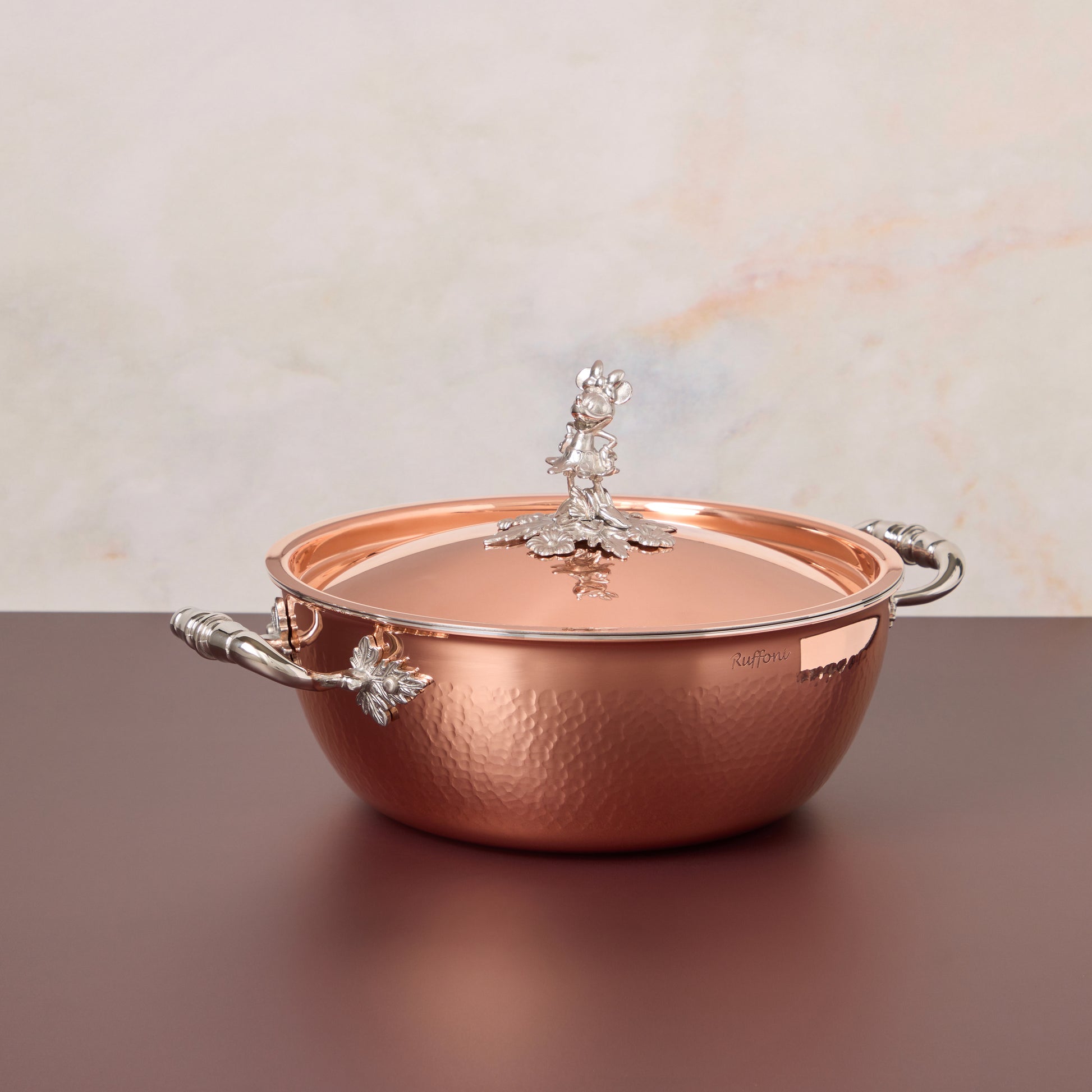 Disney x Ruffoni Opus Cupra 4qt chef pot hammered copper with stainless steel lining and decorated  Minnie Mouse stainless steel knob from Ruffoni