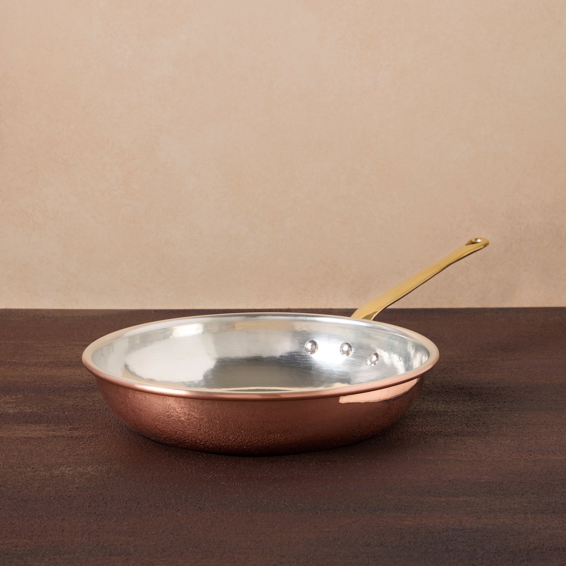 Hammered copper 10" Frying Pan lined with high purity tin applied by hand over fire and bronze handles, from Ruffoni Historia collection