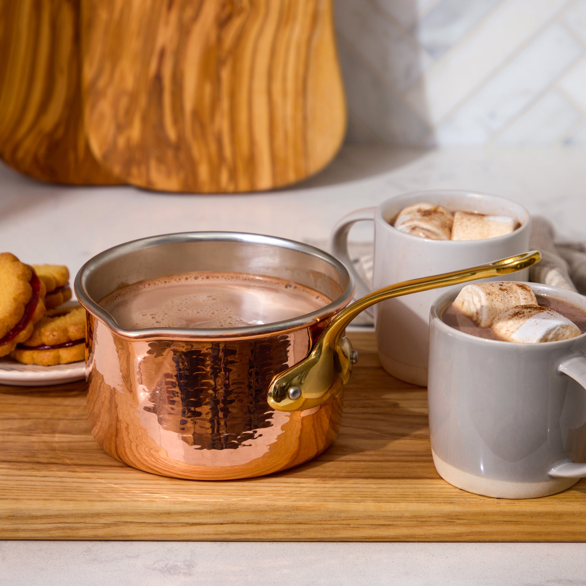 Ruffoni copper Saucepan with spout crafted in pure copper and tin lined by hand over fire used to make hot chocolate for the kids