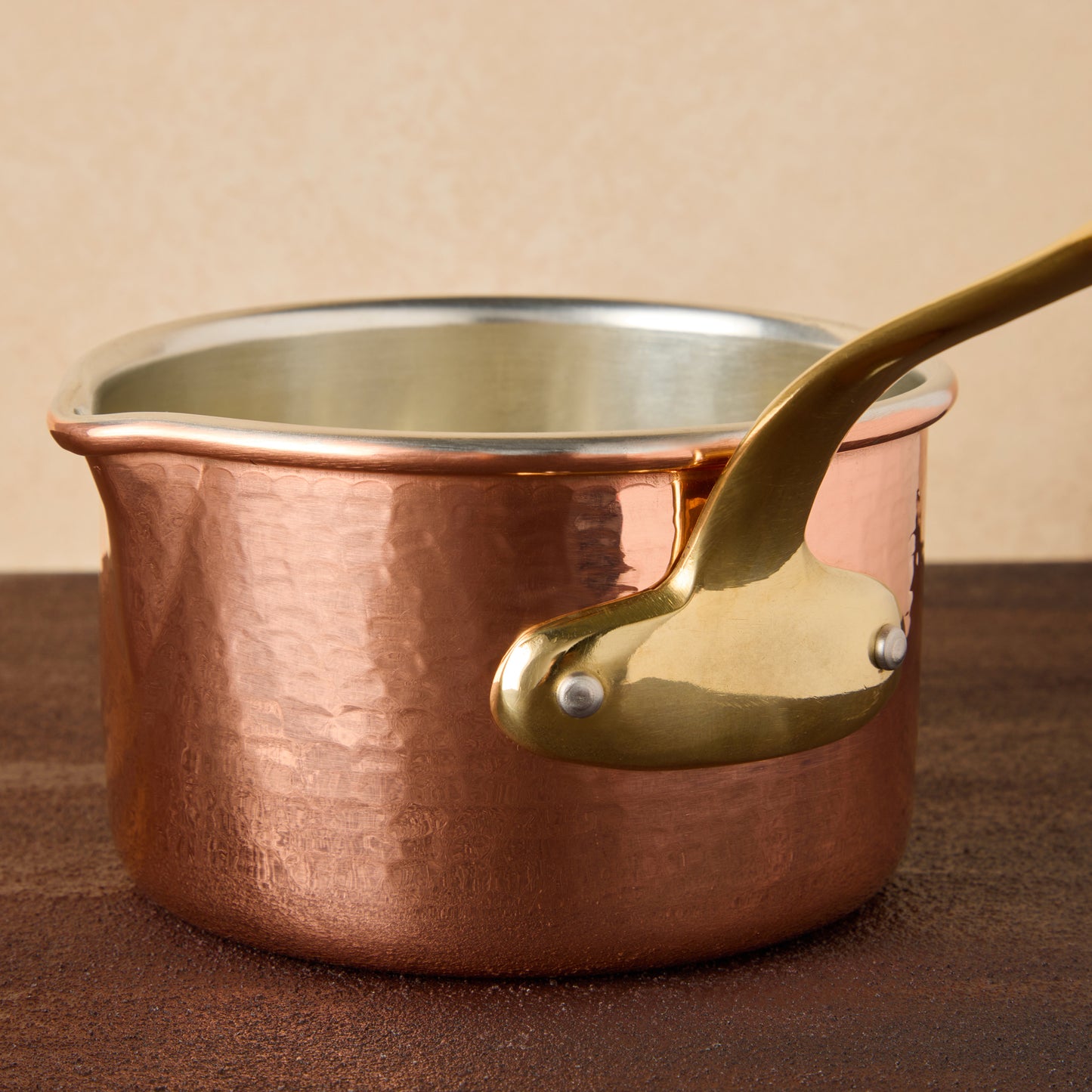 Ruffoni copper Saucepan details: the riveted handle is cast of solid bronze