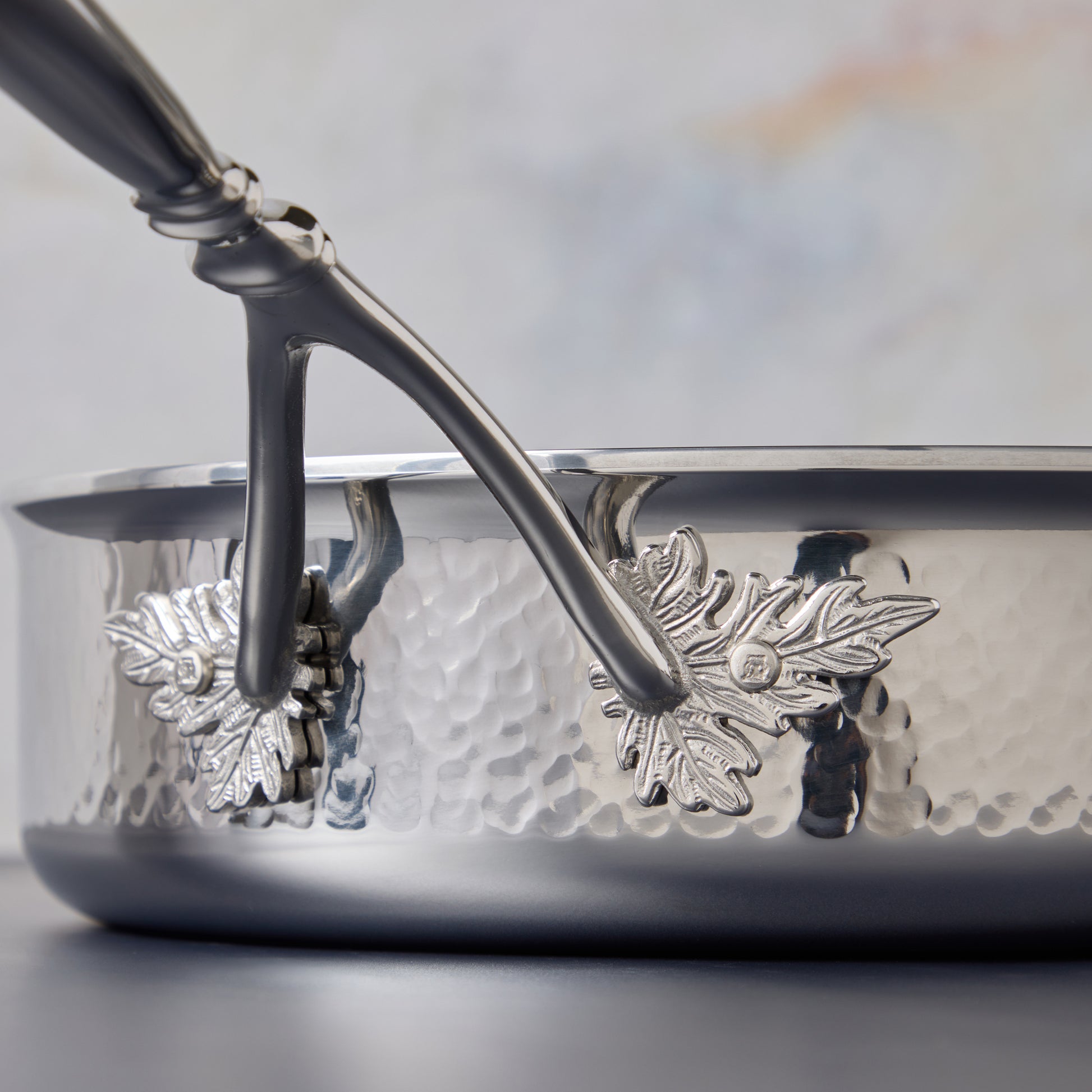 Ruffoni Opus Prima Sauté Pan 3.5qt crafted in hammered stainless steel and decorated with Ruffoni iconic motifs