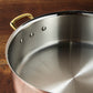 Stainless steel lined interior of a Ruffoni Olivia Cupra copper with brass side handles