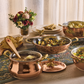Lunch spread served in hammered copper cookware from the Historia collection
