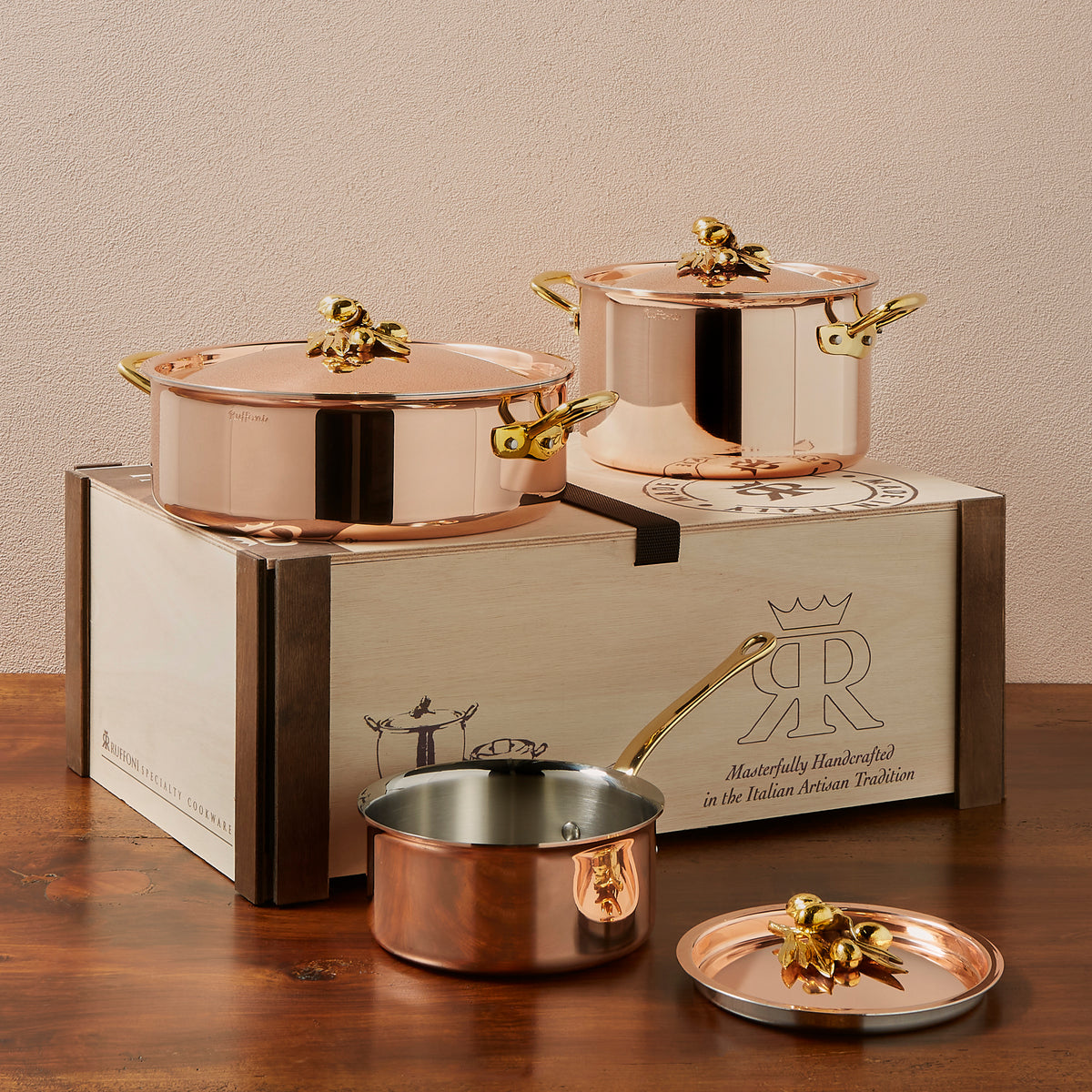Ruffoni Olivia Cupra 6-piece copper cookware set with stainless steel lining, brass handles and decorated lids with brass olive and leaf knob finials