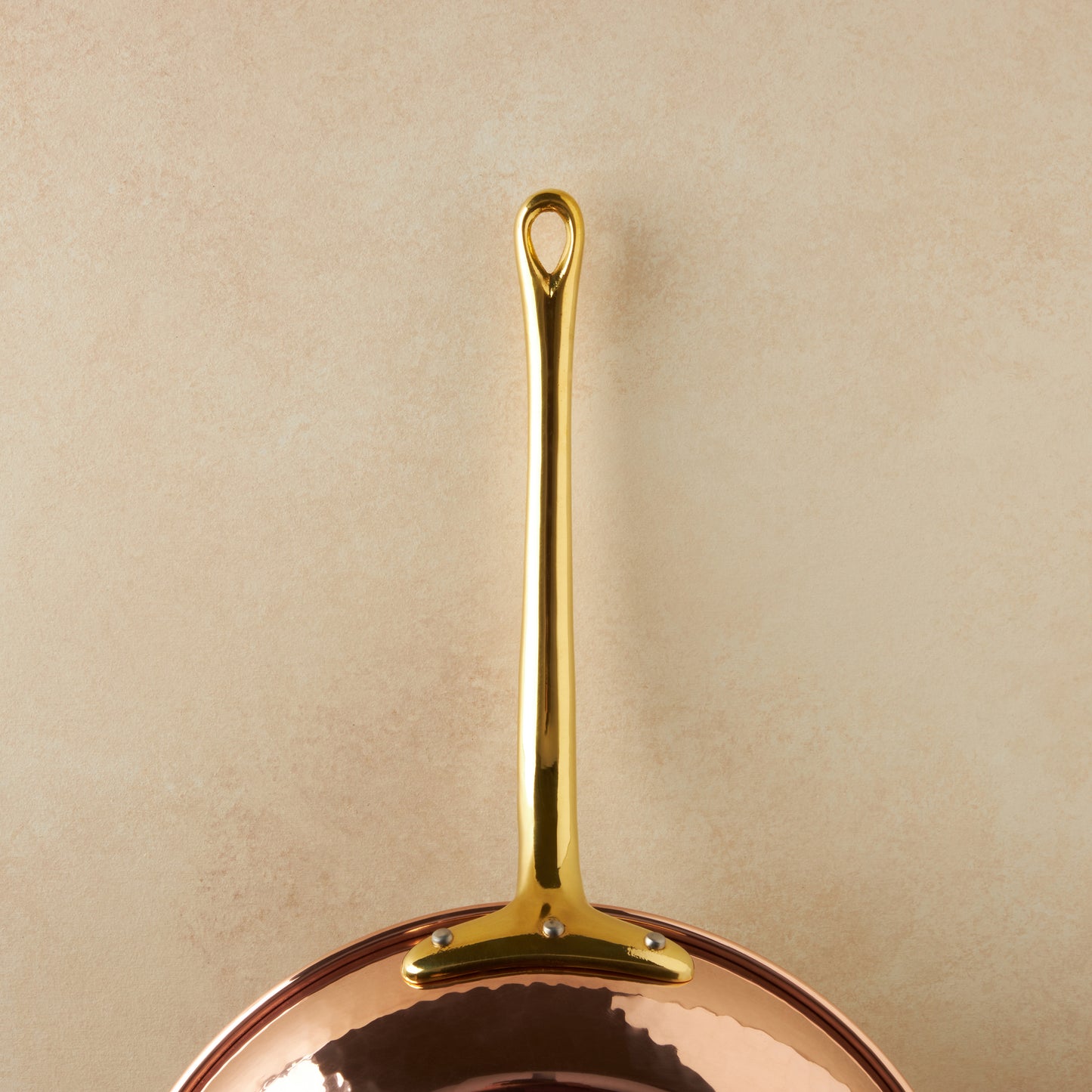 Beautiful bronze long stick handle  on Historia cookware by Ruffoni