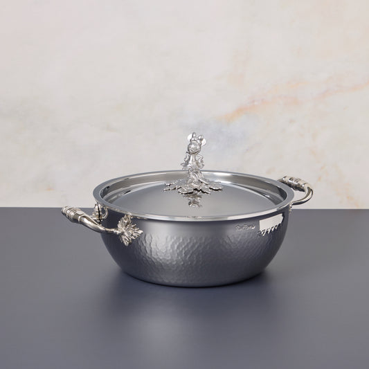 Disney x Ruffoni Opus Prima 4qt chef pot hammered clad stainless steel with special edition Disney-inspired knobs in stainless steel featuring Minnie Mouse, by Ruffoni