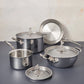 7-piece set Disney x Ruffoni Opus Prima hammered clad stainless steel with special edition Disney-inspired knobs in stainless steel featuring Mickey Mouse, Minnie Mouse, and Pluto by Ruffoni