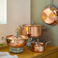 7 piece set  Disney x Ruffoni Opus Cupra hammered copper  with stainless steel lining and decorated Disney stainless steel finials from Ruffoni