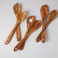 Set of six kitchen tools including spoon, spatula, risotto spoon, and spaghetti spoon, made of olivewood, by Ruffoni