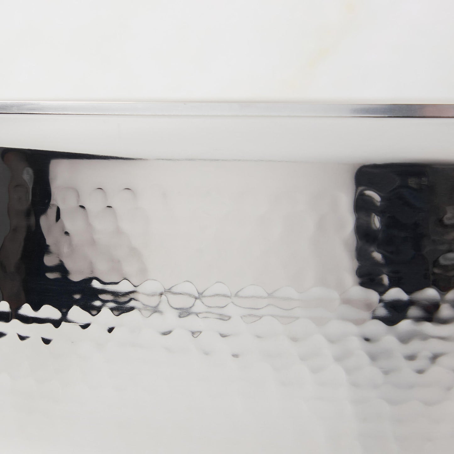 Hammering increases strength and beauty of clad stainless steel stockpot from Ruffoni