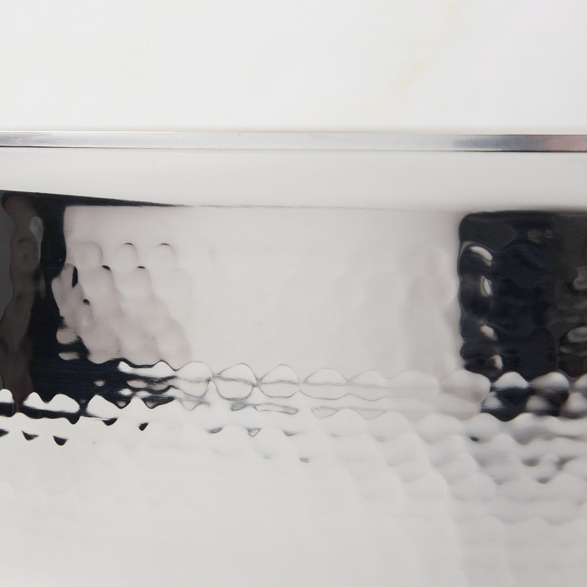 Hammering increases strength and beauty of clad stainless steel stockpot from Ruffoni