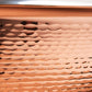 Hammering increases strength and beauty of copper clad with stainless steel braiser from Ruffoni