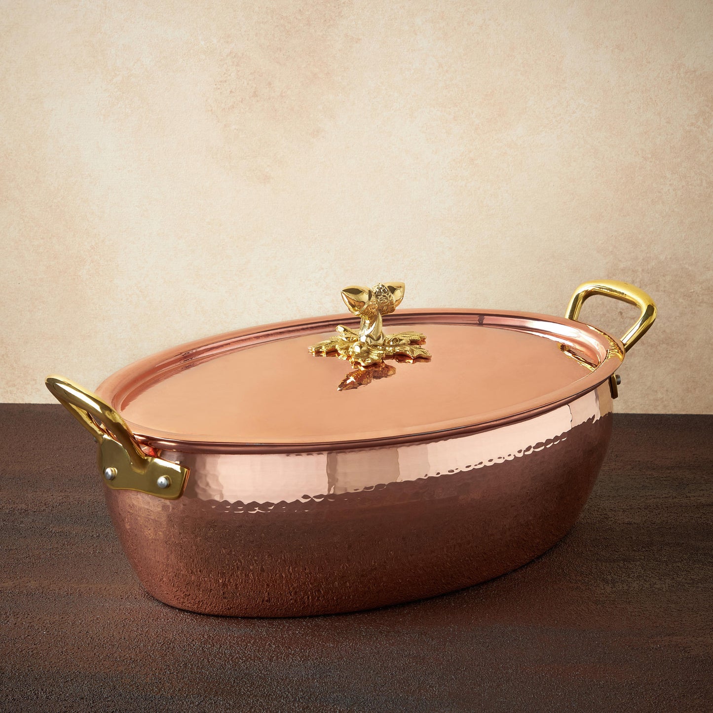 Hammered copper 8.5Qt Oval Casserole lined with high purity tin applied by hand over fire and bronze handles, from Ruffoni Historia collection