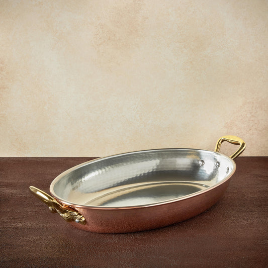 Hammered copper 14" Oval Gratin  lined with high purity tin applied by hand over fire and bronze handles, from Ruffoni Historia collection