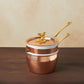 Hammered copper Bain-Marie lined with high purity tin applied by hand over fire and bronze handles, from Ruffoni Historia collection