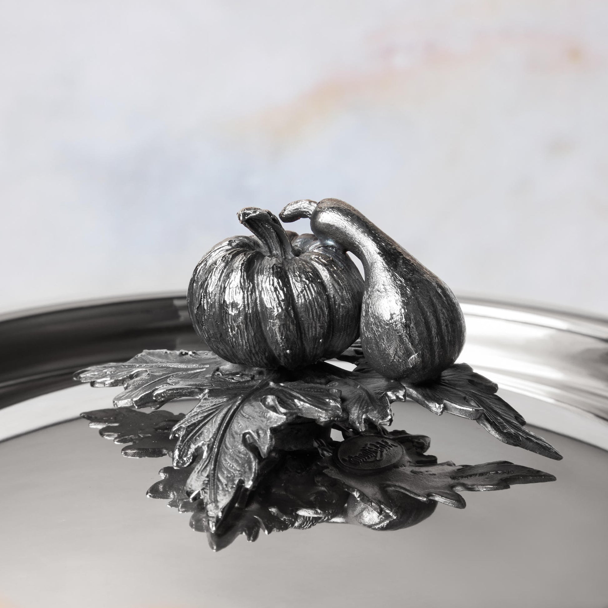 Decorated knob finial representing pumpkin and gourd, cast in solid bronze and silver plated, on Opus Prima stainless steel lid by Ruffoni