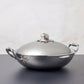 Opus Prima hammered clad stainless steel wok with decorated silver-plated lid knob finial from Ruffoni