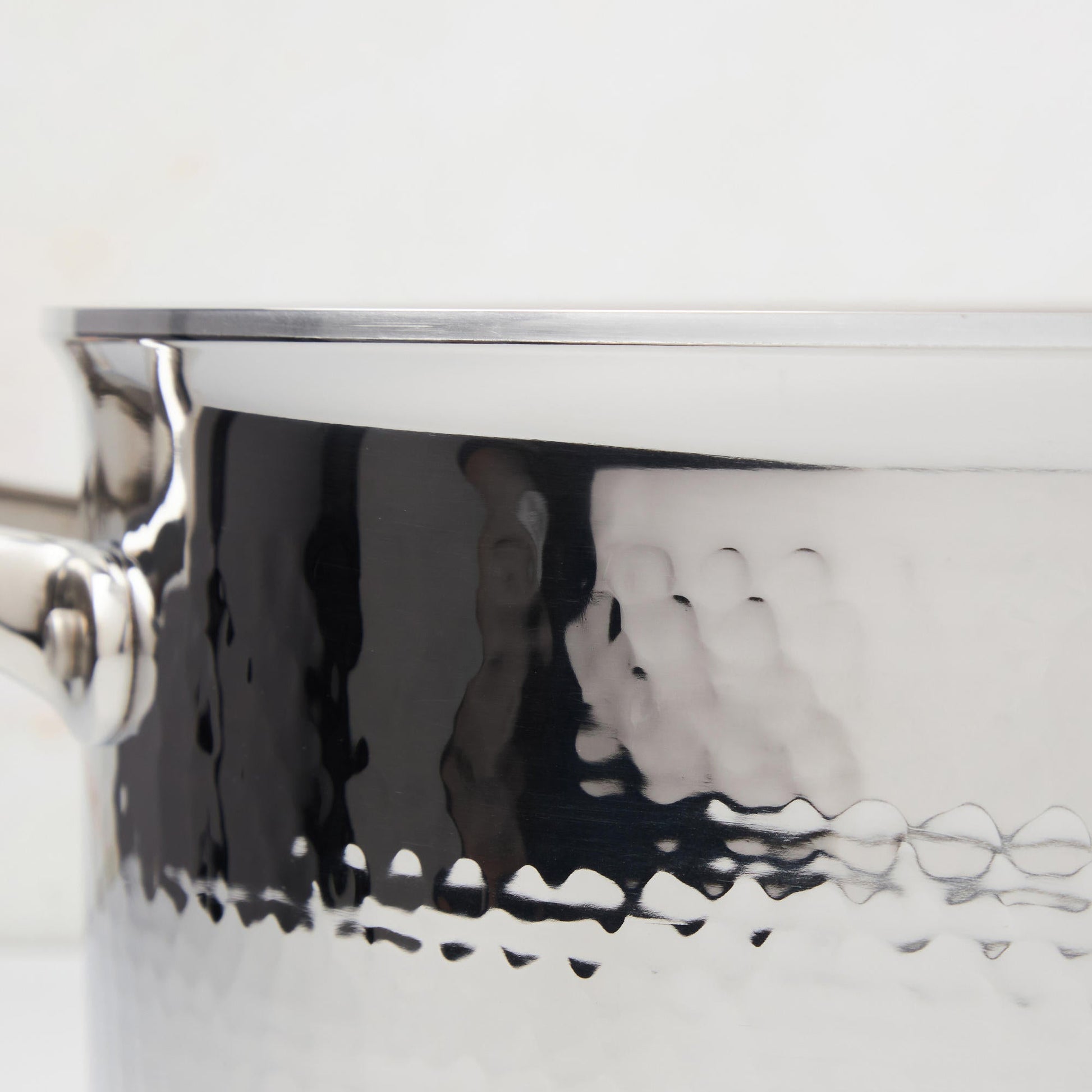 Hammering increases strength and beauty of clad stainless steel braiser from Ruffoni