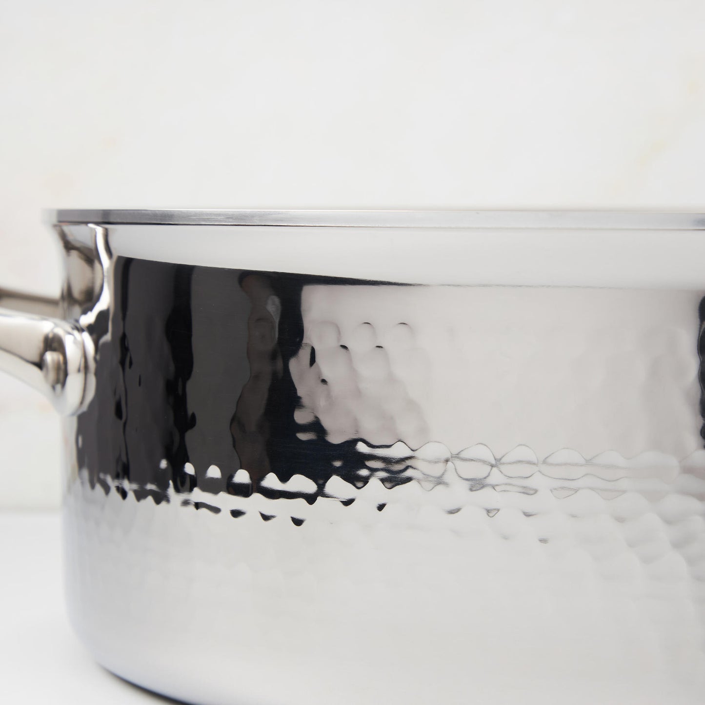 Hammering increases strength and beauty of clad stainless cookware set steel  from Ruffoni