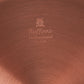 Ruffoni Made in Italy brand logo stamped under copper saucepan for authenticity