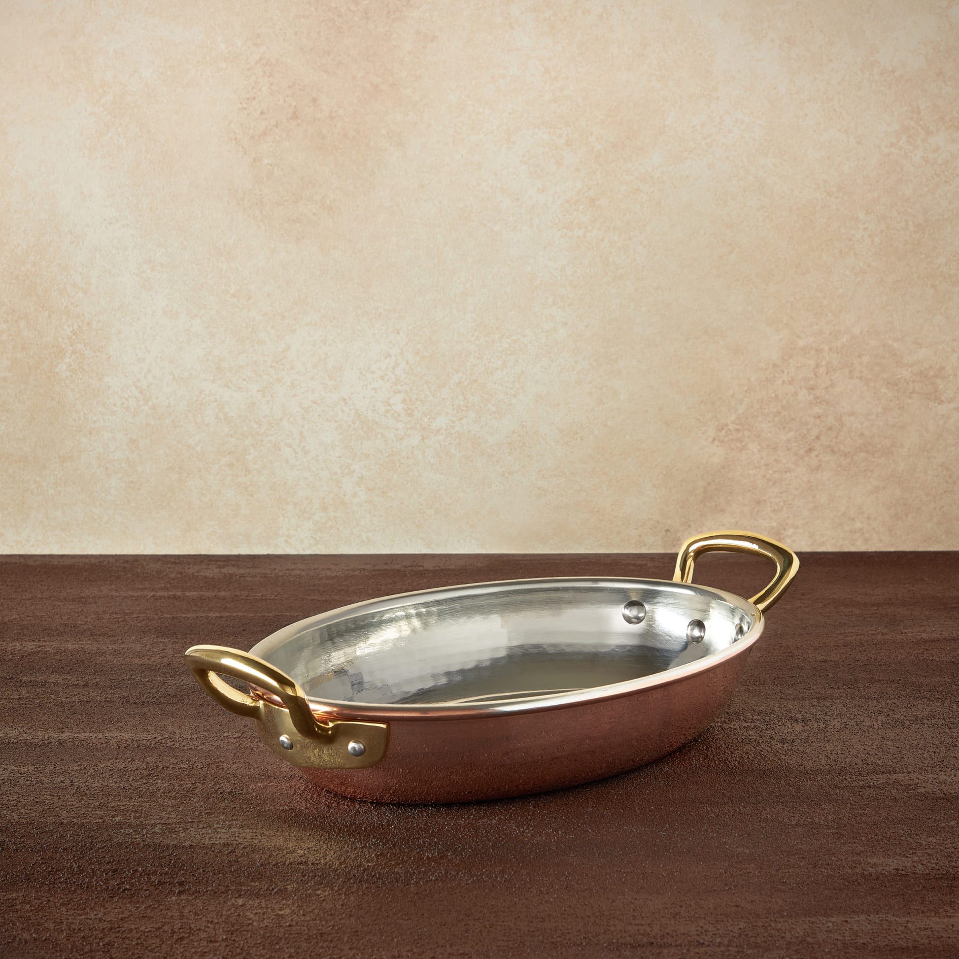 Hammered copper 11" Covered Oval Gratin lined with high purity tin applied by hand over fire and bronze handles, from Ruffoni Historia collection
