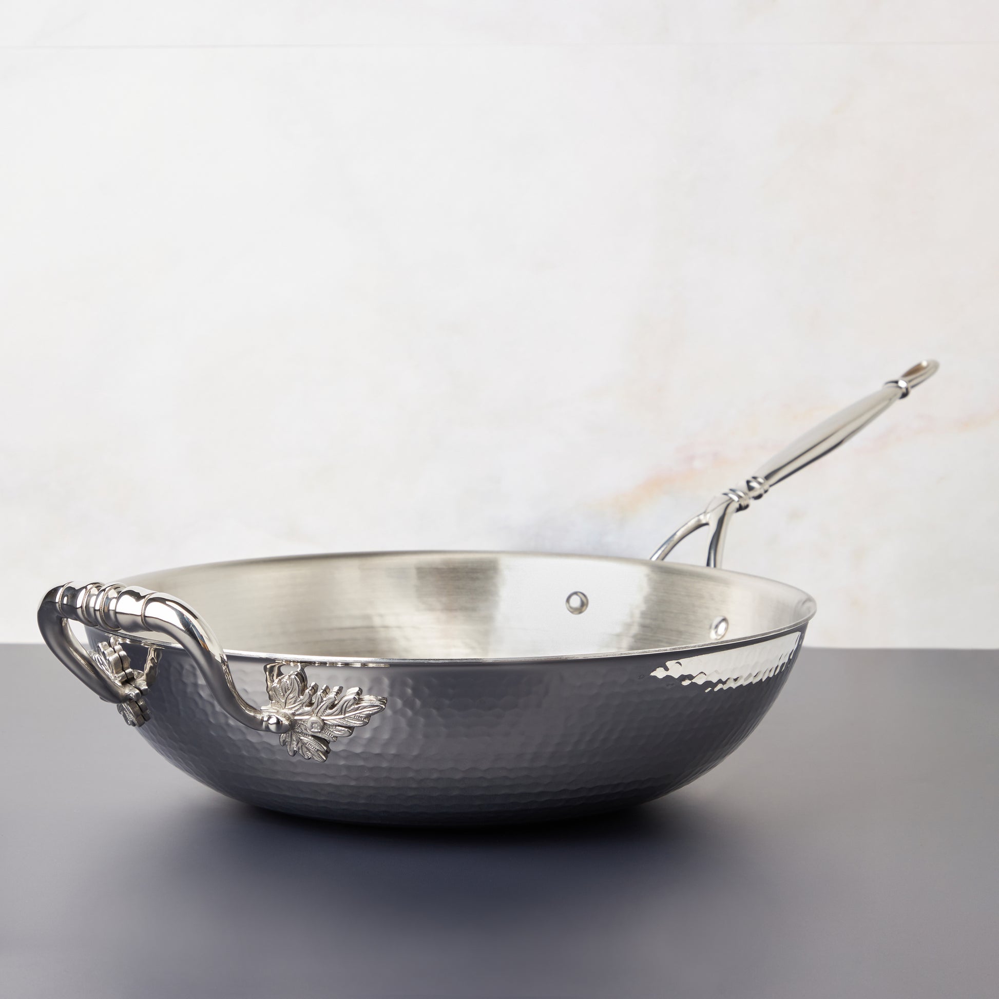 Opus Prima hammered clad stainless Open Wok decorated with delicate leaves on Opus Prima cookware by Ruffoni